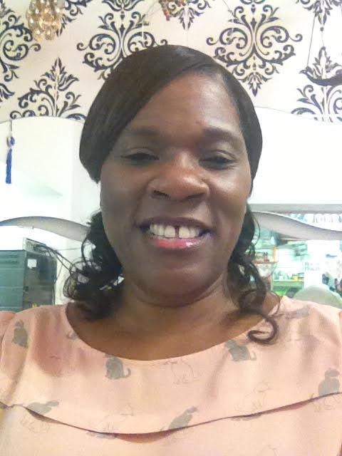 Elrose, Founder of FAACTS Ltd, in graduation gown